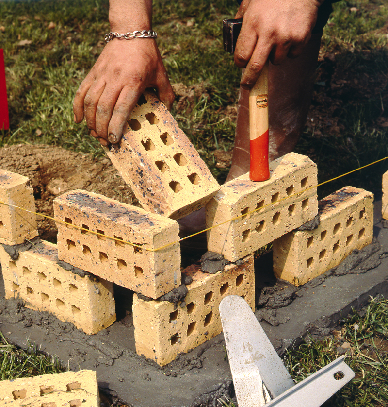 Construir uma cerca de tijolos